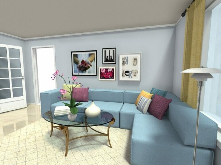 Living Room Ideas - Art wall above blue sofa